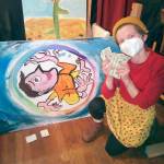 The 2022 winner, Otto Younker, is pictured with her creation and prize. (photo courtesy of Sarah Tucker)