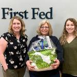 Branch Manager Nicole Pruden (right) and Asst. Branch Manager Heather Little (left) with winning customer at First Fed Sequim Village. Photo courtesy First Fed