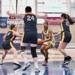 Peninsulas Chasity Selden is surrounded by a triple team from Linn-Benton during the Pirates NWAC Womens Basketball Tournament contest at Columbia Basin College on Thursday. (Jay Cline/for Peninsula College)