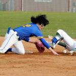 KEITH THORPE/PENINSULA DAILY NEWS
Port Angeles' Alex Angevine, right, looks back after sliding into second as Bremerton shortstop Brian Infante lets the ball get past him, allioing Angevine to scramble to the bag in the second inning on Tuesday at Port Angeles Civic Field.