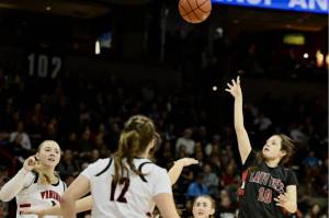 Neah Bay's Allie Greene shoots a floater over the Mossyrock defense Saturday night in Spokane. Greene finished with 19 points, leading all scorers, in the 56-54 Neah Bay win.
(Bridget Mayfield/for the Peninsula Daily News)