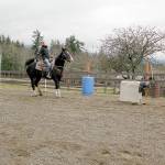 Photos by Karen Griffiths

Cutline:

Peninsula Junior Rodeo competitors Lillian Bond and Jasper practice Breakaway Roping (meaning she releases the rope after she throws the loop around the steer’s head instead it staying attached to her saddle horn and backing up to keep a tight connection between horse and steer)) using a “dummy” steer pulled by a Quad driven by her mom Jennifer Bond.