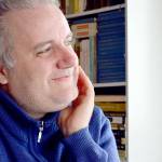 Spanish pianist Josu De Solaun fixes his gaze on the Dvorak concerto score hell perform with the Port Angeles Symphony this Saturday. (photo by Diane Urbani de la Paz)