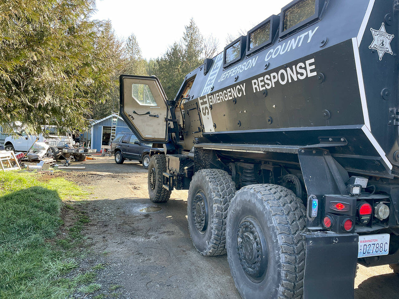 FBI agents and Jefferson County Sheriffs deputies served a search warrant Wednesday in Quilcene that is part of a multi-agency investigation covering Western Washington and at least one other state. (Jefferson County Sheriffs Office)