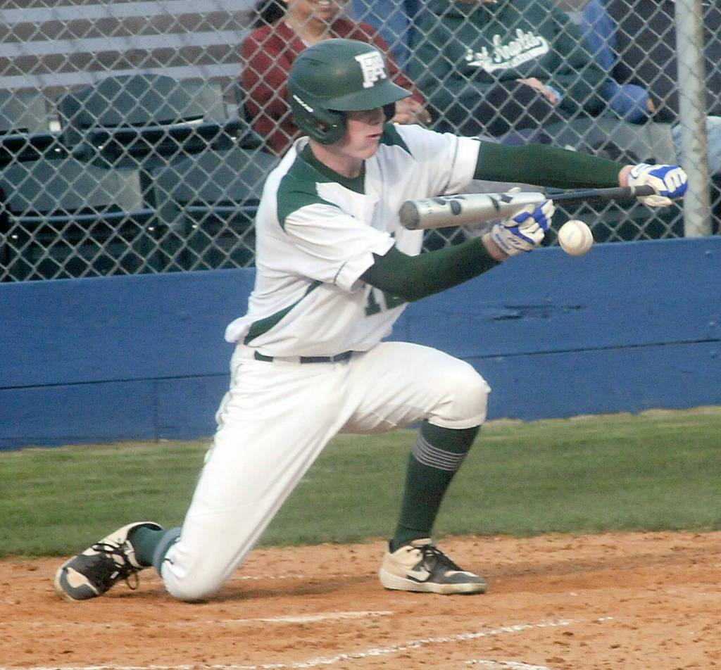 KEITH THORPE/PENINSULA DAILY NEWS
Port Angeles' Luke Flodstrom bunts in the third inning against North Kitsap on Tuesday afternoon in Port Angeles.


NOTE TO EDS: I'm guessing this is Flodstrom because that how No. 12 was listed on MaxPreps. The lineup card and the other online rosters list him as No. 15 and totally omits No. 12. Any additional guidance is welcome.
