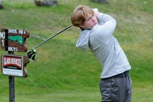 KEITH THORPE/PENINSULA DAILY NEWS
Port Angeles' Nate Anderson tees off from the first hole on Thursday at Peninsula Golf Course.