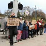 People gather at First and Lincoln streets in Port Angeles on Friday in support of transgender rights. The group was celebrating the International Transgender Day of Visibility, an annual event celebrating transgender people and raising awareness of discrimination they can face. (Keith Thorpe/Peninsula Daily News)