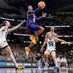 LSUs Alexis Morris shoots past Iowas Caitlin Clark during the second half of the NCAA Womens Final Four championship basketball game Sunday, April 2, 2023, in Dallas. (AP Photo/Darron Cummings)