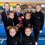 The Klahhane Bronze gymnastics team finished eighth out of 51 teams at the Washington Xcel State Championships this weekend. In the front row are, from left, Makinlee Thomason and Charlotte Neville. Center row is Paytynn Lindley and Carley Mae Riggs and back row is Lainey DePiro, Raeleigh Thomason, Harper Waterkotte and Morgan Smith. (Courtesy photo)