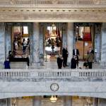 Lawmakers gather outside the State Reception Room on the second floor of the state Capitol. The legislative session ends April 23. (Paul Gottlieb/for Peninsula Daily News)