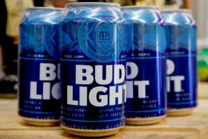 FILE - Cans of Bud Light beer are seen, Thursday Jan. 10, 2019, in Washington. On Friday, April 7, 2023, The Associated Press reported on stories circulating online incorrectly claiming Anheuser-Busch fired its entire marketing department in response to its partnership with a transgender influencer and the rollout of LGBTQ Pride-themed Bud Light cans that feature various pronouns. (AP Photo/Jacquelyn Martin, File)