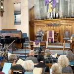 Spring director Jonathan Stafford rehearses the choir in preparation for spring Broadway concerts this weekend.