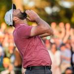 Jon Rahm, of Spain, celebrates on the 18th green after winning the Masters golf tournament at Augusta National Golf Club on Sunday, April 9, 2023, in Augusta, Ga. (AP Photo/Charlie Riedel)