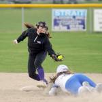 Michael Dashiell/Olympic Peninsula News Group Sequim shortstop Hannah Bates, left, puts the tag on an Olympic runner in an April 13 league match-up in Sequim.