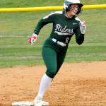 Port Angeles Heidi Leitz rounds the bases after slugging a home run in the bottom of the first against North Mason on Saturday in Port Angeles. (Keith Thorpe/Peninsula Daily News)