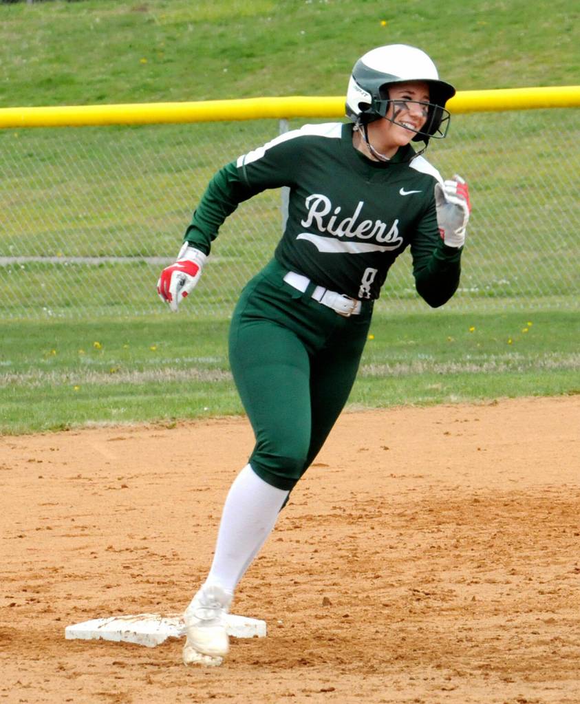 Port Angeles Heidi Leitz rounds the bases after slugging a home run in the bottom of the first against North Mason on Saturday in Port Angeles. (Keith Thorpe/Peninsula Daily News)