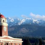 The Clallam County Courthouse is in the foreground while the Klahhane Ridge in the Olympic National Park is covered with fresh snow. High temperatures are expected to be in the the upper 40s to mid-50s this week with some rain showers in the forecast. (Dave Logan/Peninsula Daily News)