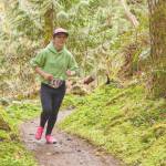 Marleigh Olson of Arlington runs in the half-marathon in the 10th annual OAT run held in the hills south of Joyce on Saturday. (Matt Sagen/Cascadia Films)