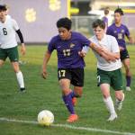 Michael Dashiell/Olympic Peninsula News Group
Sequim's Abe Torres, left, vies with Port Angeles' Kaleb Gagnon during the Wolves' 1-0 win over the Roughriders on Tuesday.