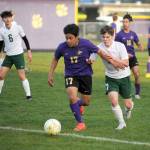 Sequims Abe Torres, left, vies with Port Angeles Kaleb Gagnon during the Wolves 1-0 win over the Roughriders on Tuesday. (Michael Dashiell/Olympic Peninsula News Group)