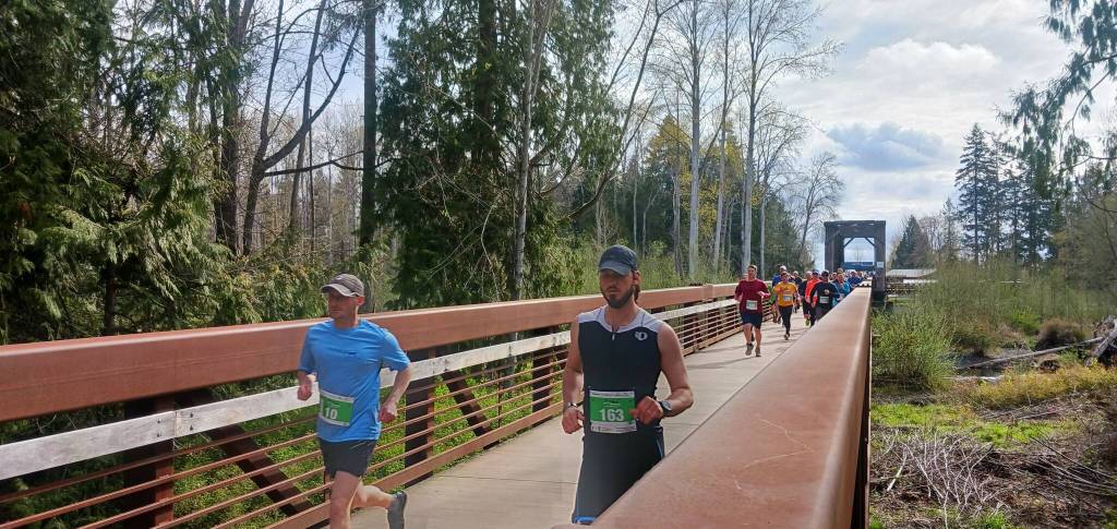 A beautiful morning greeted nearly 300 runners at the Sequim Railroad Bridge on Saturday. (Pierre LaBossiere/Peninsula Daily News)