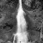 (Northwind Art Woman and Waterfall by Alisa Steck) Woman and Waterfall, at Marymere Falls, won Alisa Steck the Curators Choice Award in the Wet exhibition at Jeanette Best Gallery in Port Townsend. photo by Alisa Steck