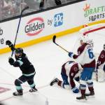 Seattle Kraken right wing Jordan Eberle (7) celebrates scoring to win the game against the Colorado Avalanche as defenseman Cale Makar (8), left wing Artturi Lehkonen (62), and goaltender Alexandar Georgiev (40) react during overtime in Game 4 of an NHL hockey Stanley Cup first-round playoff series Monday, April 24, 2023, in Seattle. The Kraken won 3-2 in overtime. (AP Photo/Lindsey Wasson)