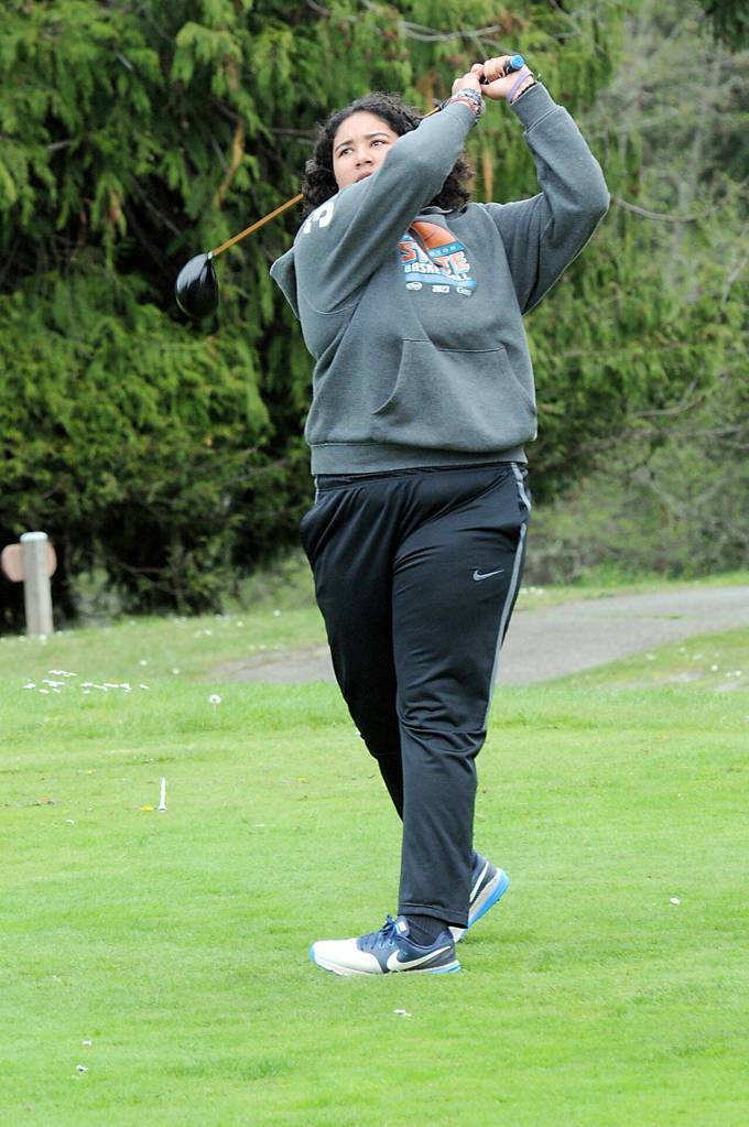 Jelissa Julmist drives takes her tee shot on the 15th hole at Peninsula Golf Club during Tuesdays Duke Streeter Memorial Invitational Tournament. (Keith Thorpe/Peninsula Daily News)