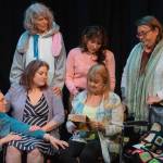 Front, from left to right, Merrin Packer, Taryn Dupont, Cheryl DiPietro and, behind, Cheryl Tamblyn, Jamie Pauley and Amy Henry participate in a poignant scene in Calendar Girls, Olympic Theatre Arts newest production. (Emily Matthiessen/Olympic Peninsula News Group)
