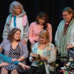 Front, from left to right, Merrin Packer, Taryn Dupont, Cheryl DiPietro and, behind, Cheryl Tamblyn, Jamie Pauley and Amy Henry participate in a poignant scene in Calendar Girls, Olympic Theatre Arts newest production. (Emily Matthiessen/Olympic Peninsula News Group)