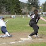 Lonnie Archibald/for Peninsula Daily News Forks Elizabeth Soto steals third during the first game of a double header at the Fred Orr Memorial Park in Beaver with Pacific League opponent Ocosta.