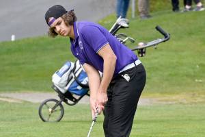 Michael Dashiell/Olympic Peninsula News Group
Sequim's Lars Wiker putts during a match against Olympic played Wednesday at The Cedars at Dungeness.