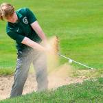 Port Angeles golfer Nate Anderson escapes a sand trap during the Olympic League Golf Championships at Kitsap Golf & Country Club on Monday. (Nicholas Zeller-Singh/Kitsap News Group)