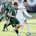 Port Angeles Kaleb Gagnon, center, pushes past Highlines Alturo Palomino-Guiterrez, right, as teamates Zak Alton, back, and Hannes Spieker follow from the backfield during Tuesdays playoff game at Wally Sigmar Field in Port Angeles. (Keith Thorpe/Peninsula Daily News)