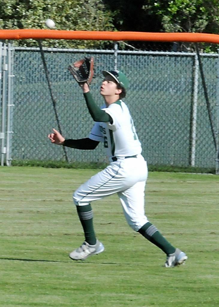 KEITH THORPE/PENINSULA DAILY NEWS Port Angeles centerfielder Kaleb Mullen catches a fly ball in the bottom of the third inning against Franklin Pierce on Wednesday at Port Angeles Civic Field.