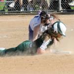 Port Angeles baserunner Lily Halberg makes a diving slide into second as the ball gets past Sequim shortstop Hannah Bates last week in Port Angeles. Both teams begin play in the bi-district tournament Friday. (Keith Thorpe/Peninsula Daily News)