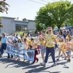 Steve Mullensky/for Peninsula Daily News

The Salish Coast Elementary School Eagles march along Lawrence Street in Uptown Port Townsend in the annual Rhody Kiddies Parade on Saturday. Over 600 kids were registered for the parade.
