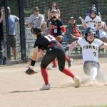 Forks Keira Johnson steals second well ahead of the throw to Toledos Candance Clark Saturday in Fort Borst Park in Centralia, where Forks defeated the Riverhawks 4-2, earning a trip to the state tournament. (Lonnie Archibald/for Peninsula Daily News)