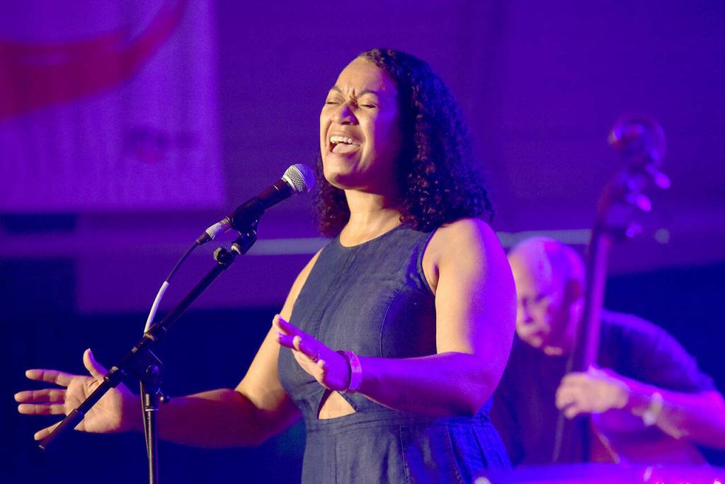 Jacqueline Tabor sings with the Jacqueline Tabor Jazz and Blues Band, including bassist Ted Enderle, right, on Friday at Vern Burton Community Center. (Keith Thorpe/Peninsula Daily News)