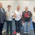 Pictured, from left to right, are Chimcum High School teacher Brian MacKenzie, Keanu Morrison Tessa Richardson, Elliot Pflueger and League of Women Voters essay team organizer, Jackie Aase.