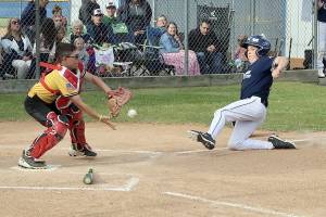 It was the Elks at 10-3 versus the Lions at 11-2 records at the annual Cal Ripken City Championship of players 12 and under. It wasn’t even close. Elks won big. The Elks hit well and were good on defense and won going away. Elks lost in the championship game last year but not this time around.

	ID: Elks catcher Kyler Williams gets a toss back from the pitcher on a bunt attempt. The hitter did make it to first OK, but the runner from third Lions’ Gavin Doyle was out at the plate trying to steal home dlogan