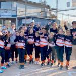 Diamond Roofing won the Port Angeles city championship this weekend in minors softball. From left are Jane Curran, Lilyanne Penic, Cami Fors, Olivia Lampman, Chloe Anderson, Hunter Steffan, Bailey Dahl, Duffy Fors, Lucy Haller, Avi Pimentel, Natalie Whitmore, Stephanie Whitmore, Loren Almond, Sami Whitmore and Ryan Whitmore. (Courtesy photo)