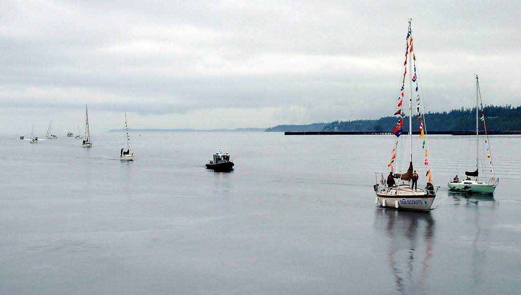 A floatilla of vessels takes part in a boat parade on Saturday in Port Angeles Harbor. (Keith Thorpe/Peninsula Daily News)