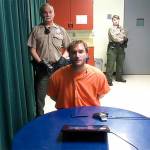 Bret Kenney appears in court via video in May 2022 after being accused of killing his mother, Teri Ward of Sequim, and attempting to kill Sequim police officer Daniel Martinez during a traffic stop in 2022.