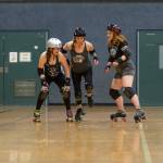 Emily Matthiessen / Olympic Peninsula News Group
From left, Amber Ahrens, Shauna Rogers McClain and Brittney Vincent practice blocker and jammer moves at a recent roller derby practice.