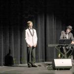 Everett Polansk, 14, provides the first performance at the Field Hall Theater. (Lexie Winters)