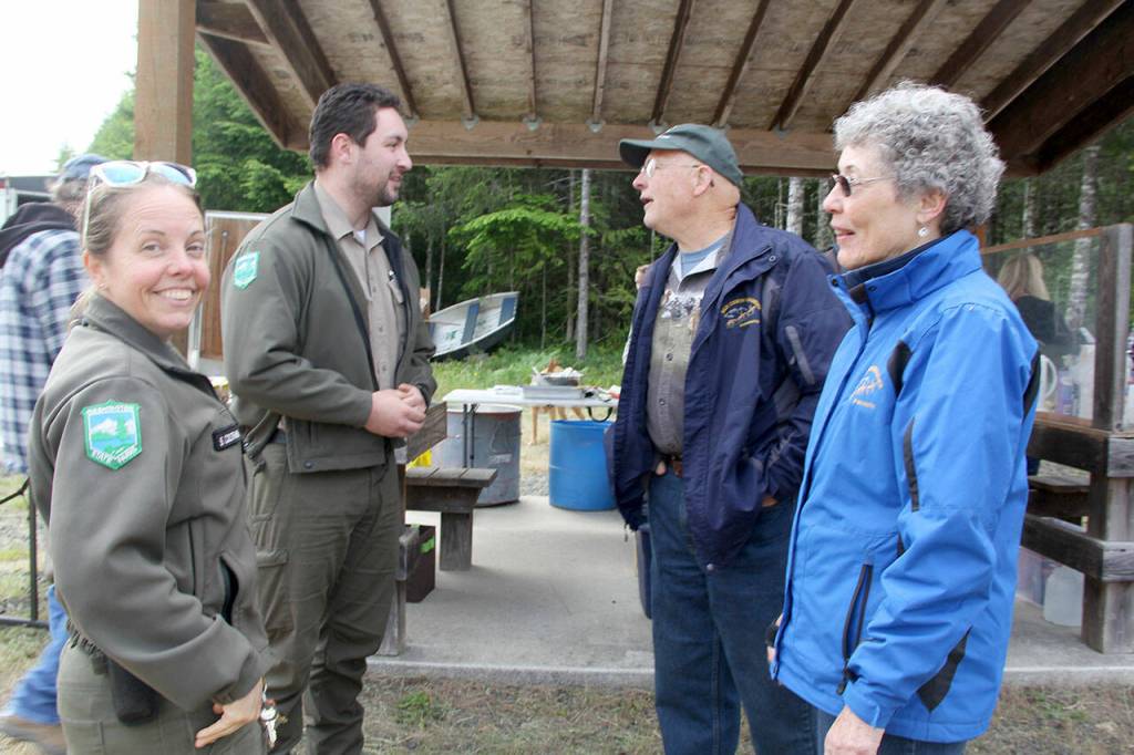 Washington State Park Rangers Stacy Coltrain and Evan Haro, with BCH members Donna and Jim Hollatz, thanked the Peninsula Chapter members for their ongoing maintenance work of clearing the trail system of fallen trees and other debris throughout the park. (Karen Griffiths/for Peninsula Daily News)