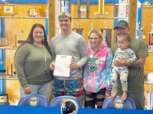 From left, mother Alicia Ferro-May, Conner Ferro-May, sister Chloe Ferro-May and stepfather Rich Albaugh celebrate Crescent senior Conner Ferro-May signing a letter of intent to participate in track and field at Mount Hood Community College in Gresham, Ore. (Crescent High School)