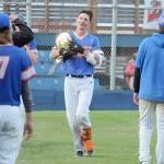 KEITH THORPE/PENINSULA DAILY NEWS
Lefties center fielder Kam Koester carries an award belt back to the dugout that was was handed to him by a teammate after rounding the bases with a two-run homer in the third inning against the Nanaimo Night Owls on Tuesday night in Port Angeles.