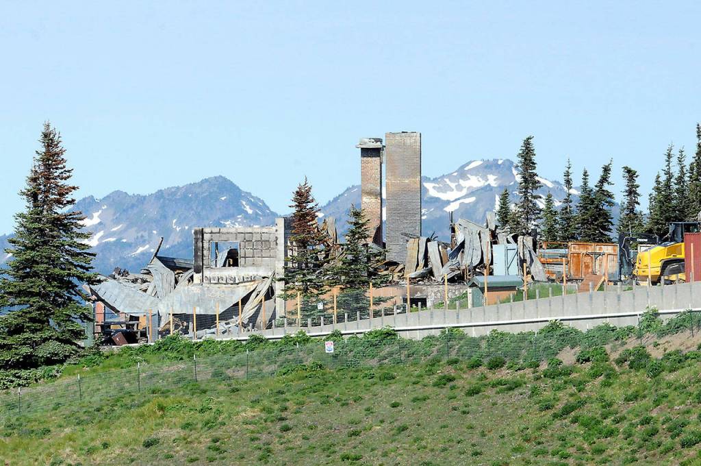 The ruins of the Hurricane Ridge Day Lodge remain at the site on Tuesday, the aftermath of a fire that destroyed the structure on May 7. (Keith Thorpe/Peninsula Daily News)